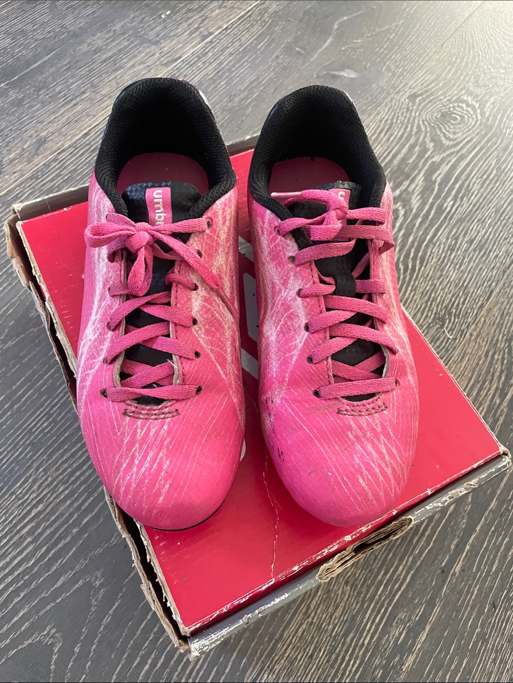 Umbro Pink kids soccer cleats and box
